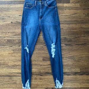 Just black denim - size 27. Lightly worn